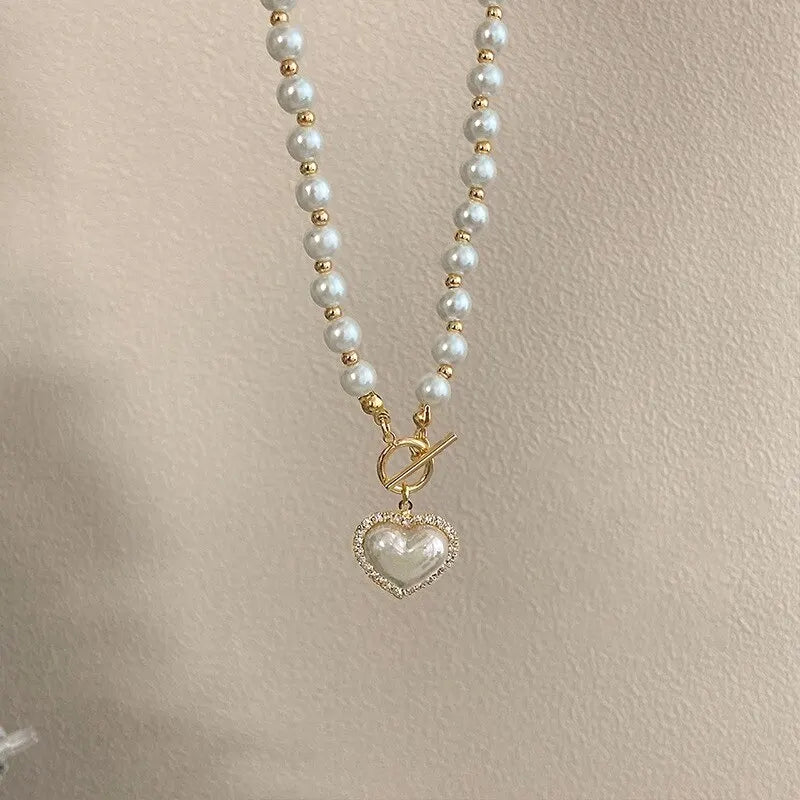 Elegant Pearl Necklace with Heart Pendant