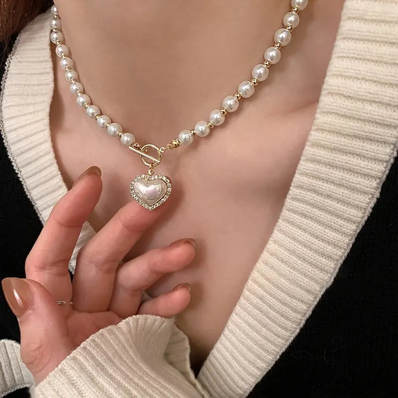 Elegant Pearl Necklace with Heart Pendant