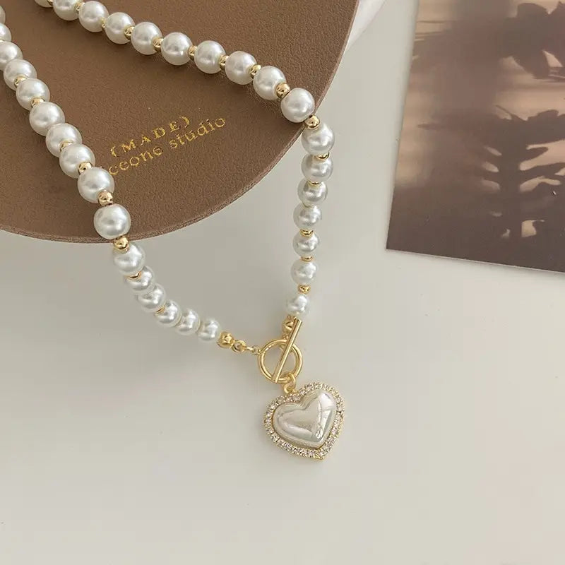 Elegant Pearl Necklace with Heart Pendant