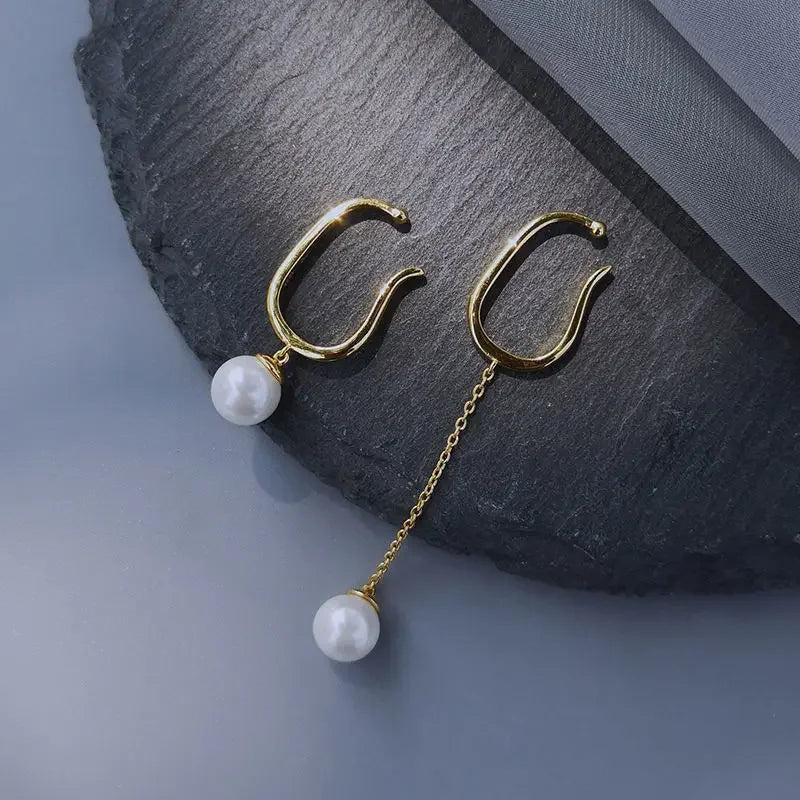Golden Drop Pearl Earrings – Effortless Grace