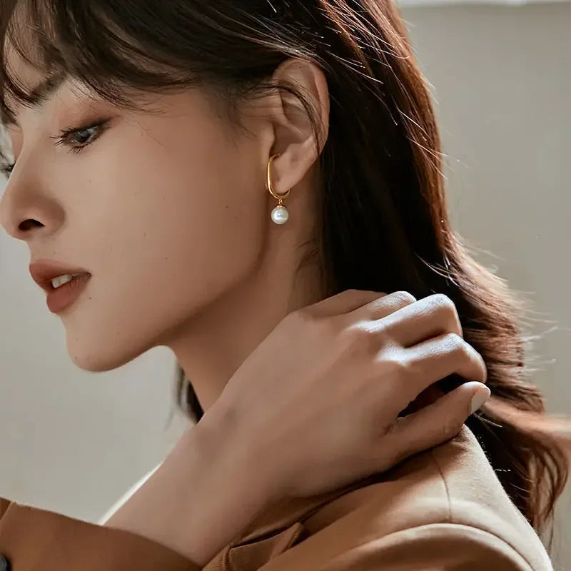 Golden Drop Pearl Earrings – Effortless Grace