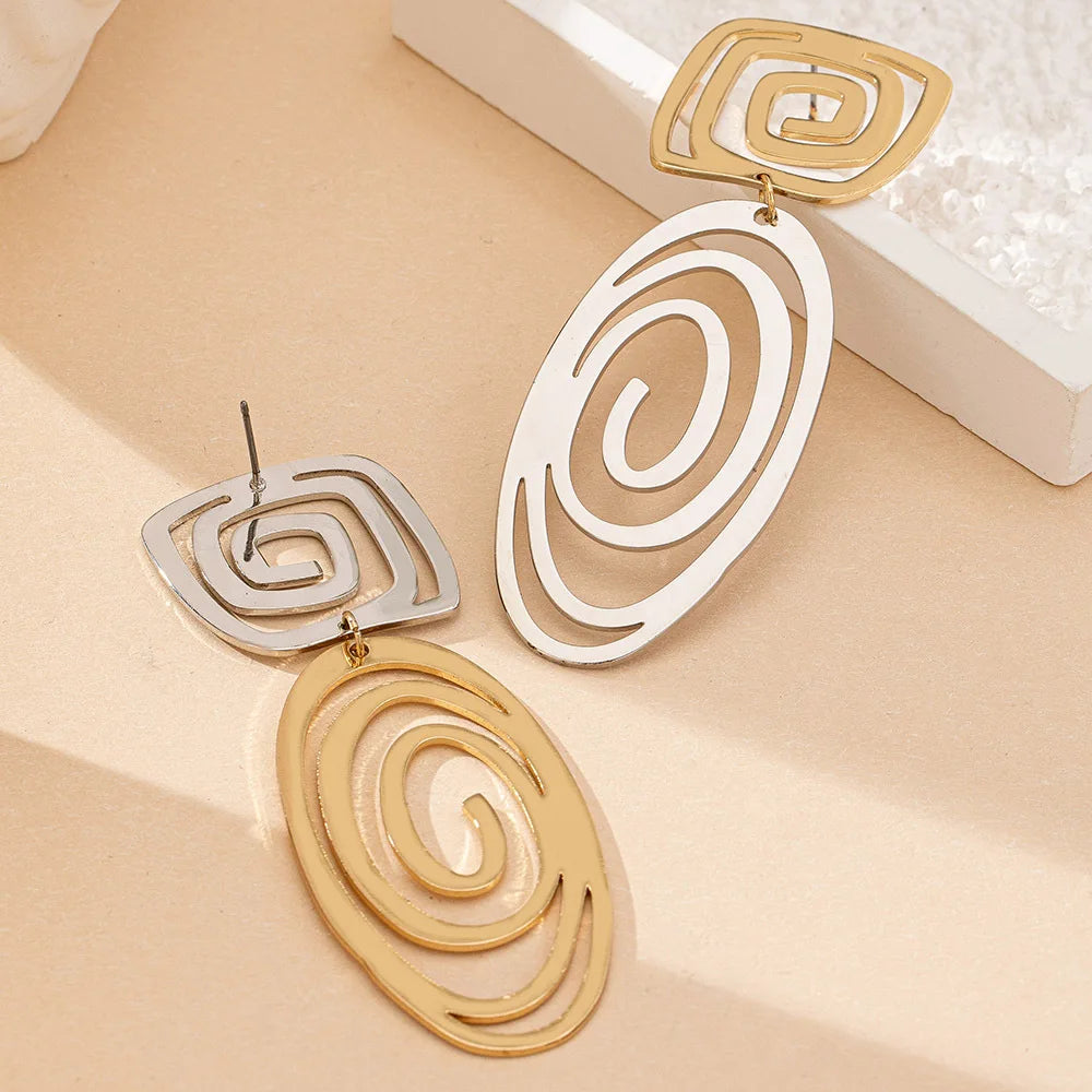 Spiral Muse Statement Earrings – Gold & Silver Duo