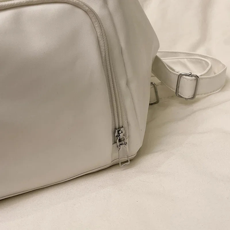 Soft Urban Triangle Backpack – Minimal & Versatile