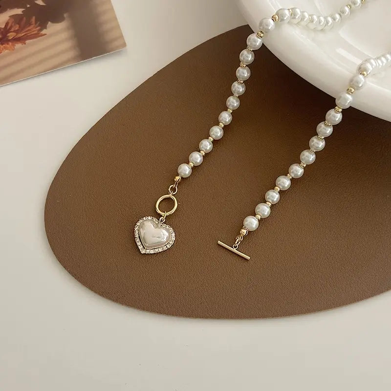 Elegant Pearl Necklace with Heart Pendant